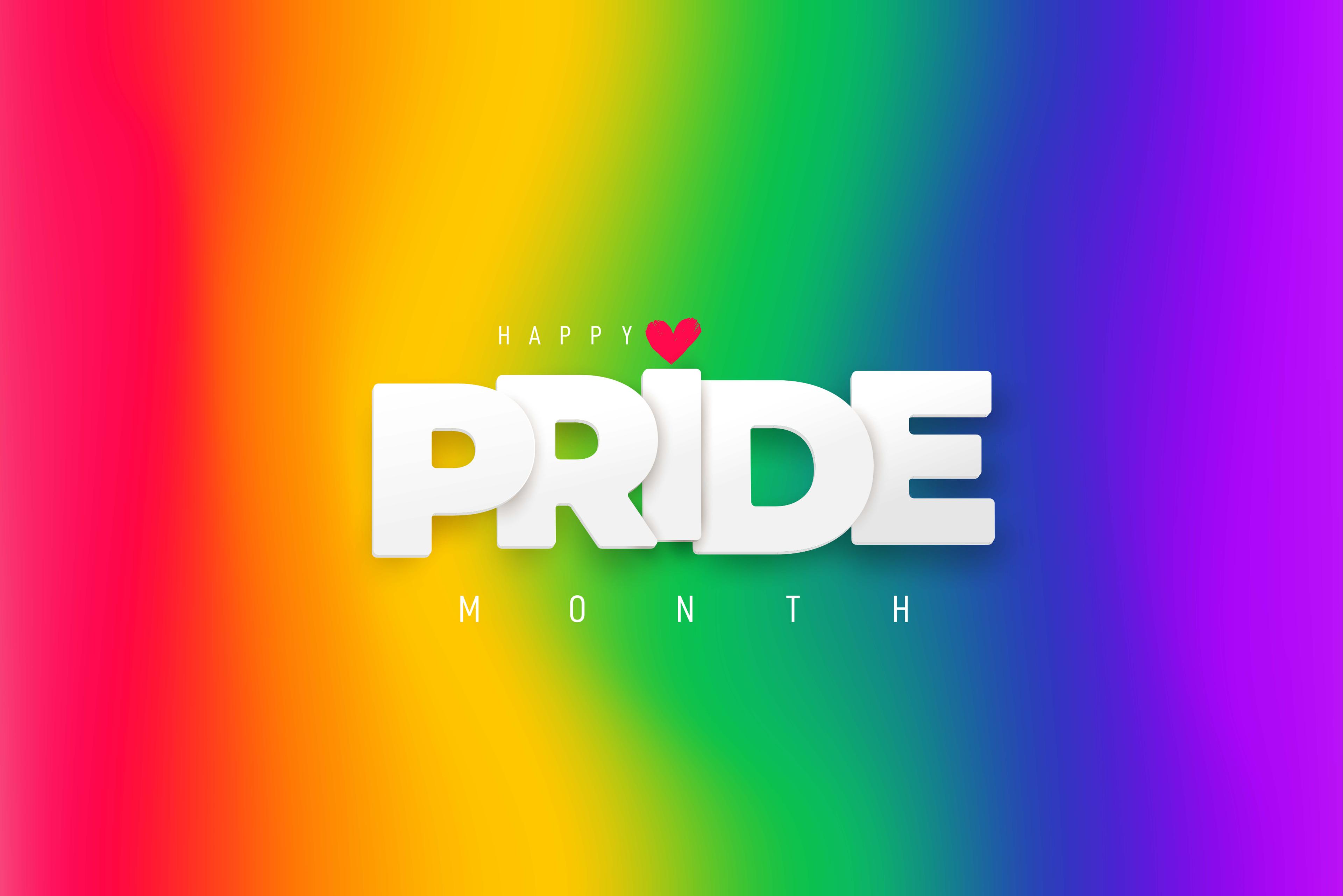 White 'PRIDE' text on vibrant rainbow gradient background with 'HAPPY' above and 'MONTH' below, featuring a small red heart